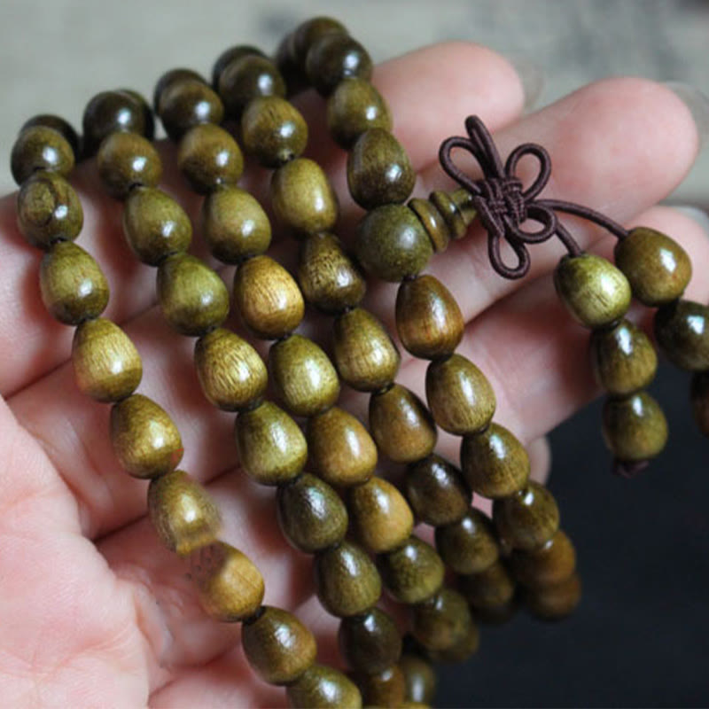 Bracelet de protection en bois naturel Phoebe Zhennan avec 108 perles en forme de larme de Mala Buddha Stones