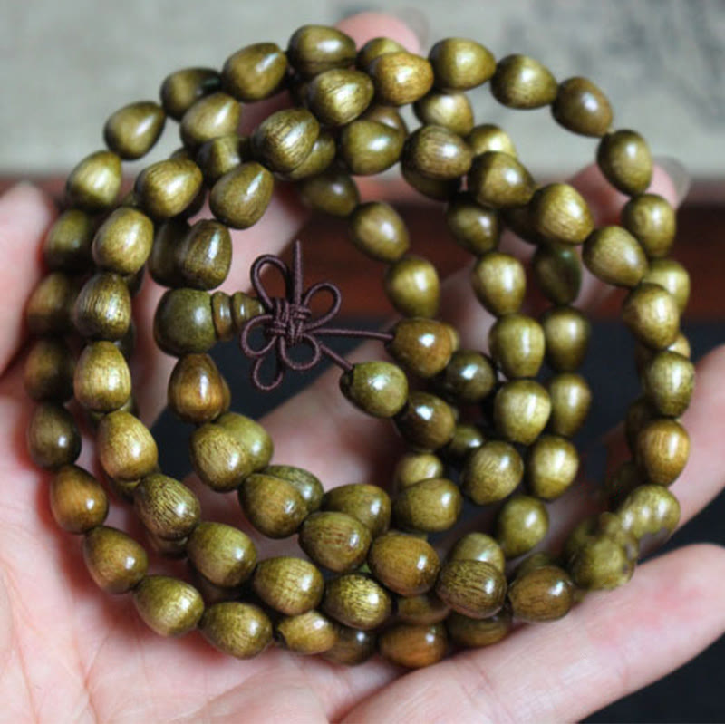 Bracelet de protection en bois naturel Phoebe Zhennan avec 108 perles en forme de larme de Mala Buddha Stones