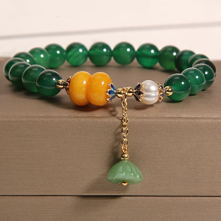 Bracelet de soutien pour gousses de lotus en agate verte et ambre avec Buddha Stones