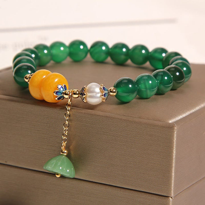 Bracelet de soutien pour gousses de lotus en agate verte et ambre avec Buddha Stones