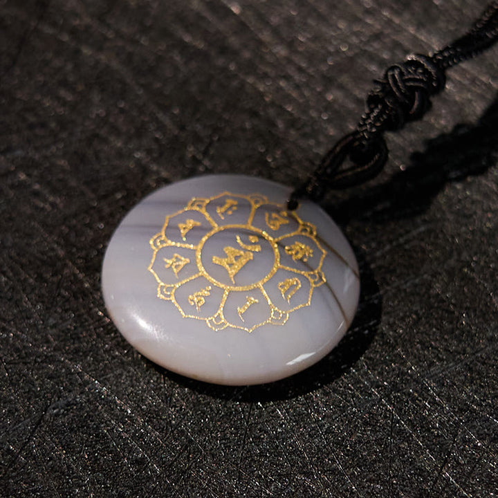 Collier pendentif en obsidienne noire avec Buddha Stones Om Mani Padme Hum et cristaux naturels divers