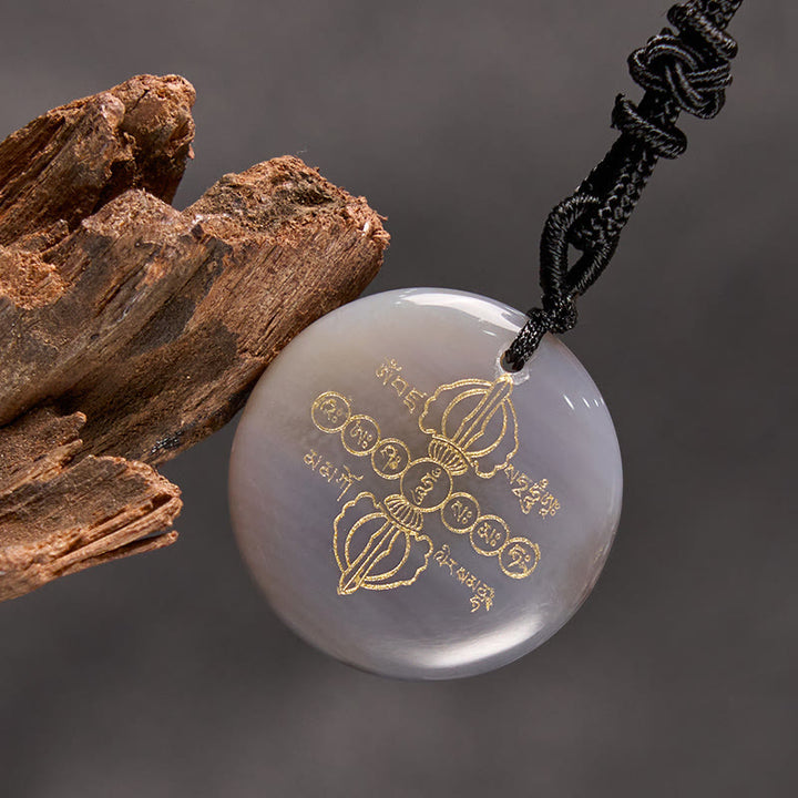 Collier pendentif en obsidienne noire avec Buddha Stones Vajra Dorje à motif sanskrit naturel et divers cristaux