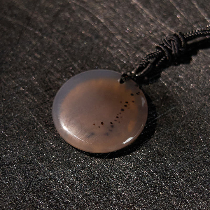 Collier pendentif de purification en obsidienne noire avec Buddha Stones et motif de lotus svastika naturel et divers cristaux