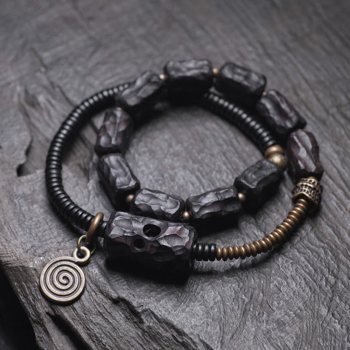Bracelet double tour en Buddha Stones, bois d'ébène, cuivre, laiton, agate rouge, paix