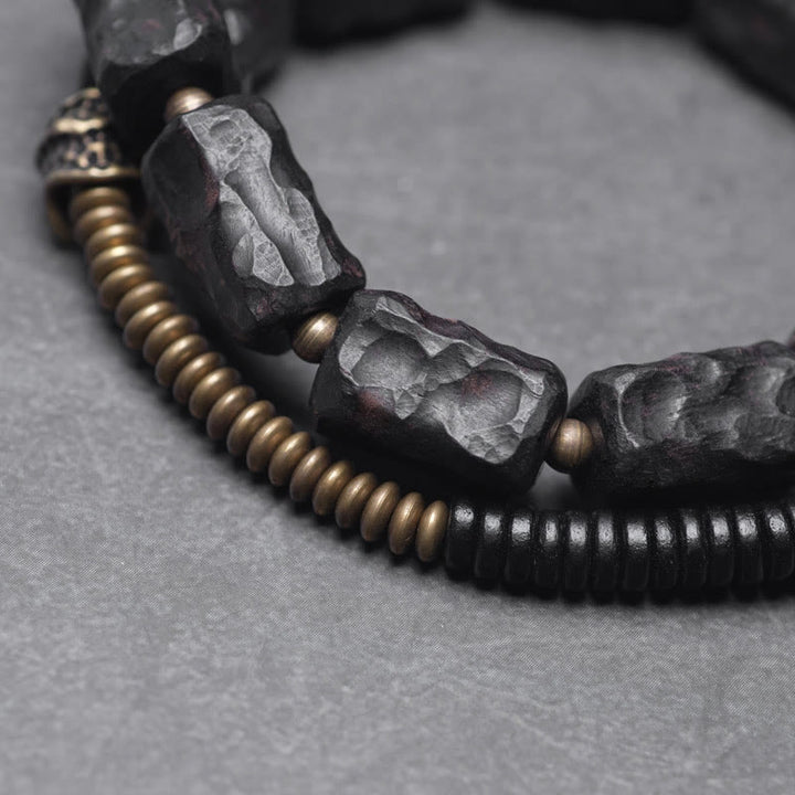Bracelet double tour en Buddha Stones, bois d'ébène, cuivre, laiton, agate rouge, paix