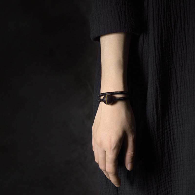 Bracelet et collier à double tour en forme de cuboïde avec boule d'équilibre en bois d'ébène et cuivre et Buddha Stones