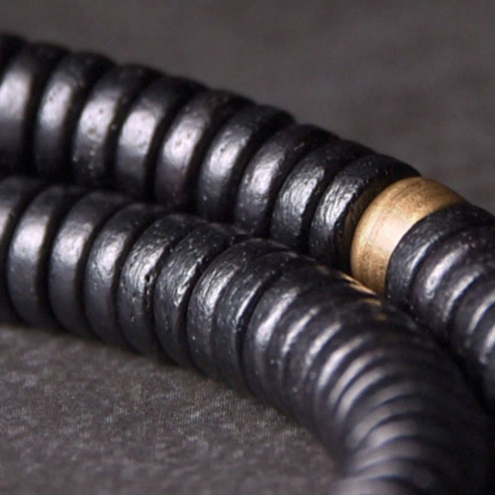 Bracelet et collier à double tour en forme de cuboïde avec boule d'équilibre en bois d'ébène et cuivre et Buddha Stones