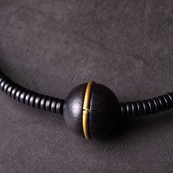 Bracelet et collier à double tour en forme de cuboïde avec boule d'équilibre en bois d'ébène et cuivre et Buddha Stones