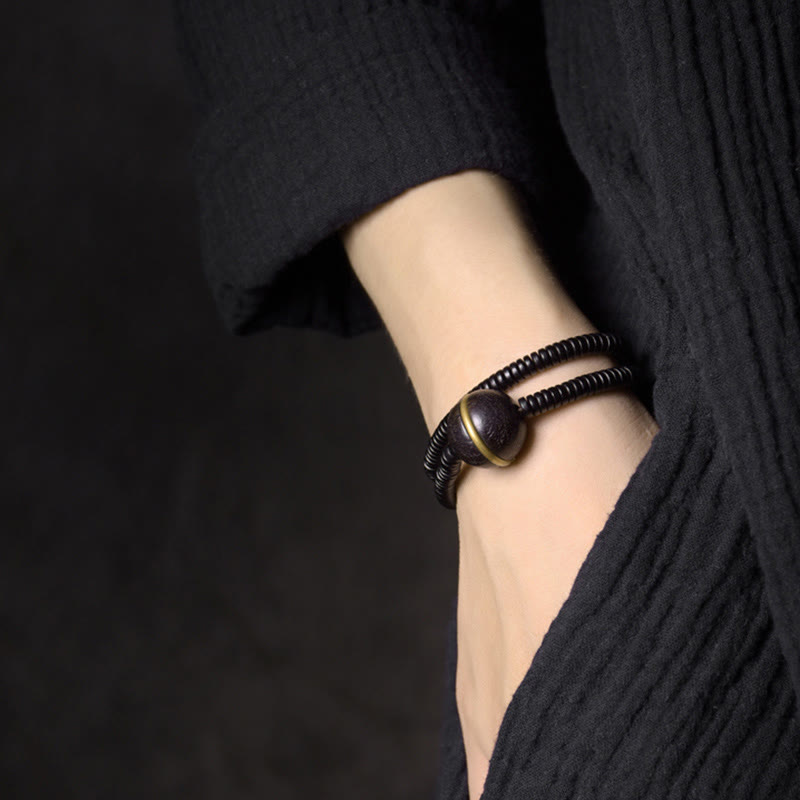 Bracelet et collier à double tour en forme de cuboïde avec boule d'équilibre en bois d'ébène et cuivre et Buddha Stones