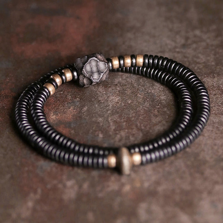 Bracelet double tour en bois d'ébène et cuivre avec Buddha Stones