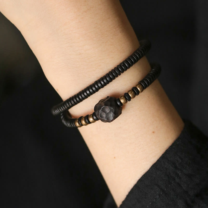 Bracelet double tour en bois d'ébène et cuivre avec Buddha Stones