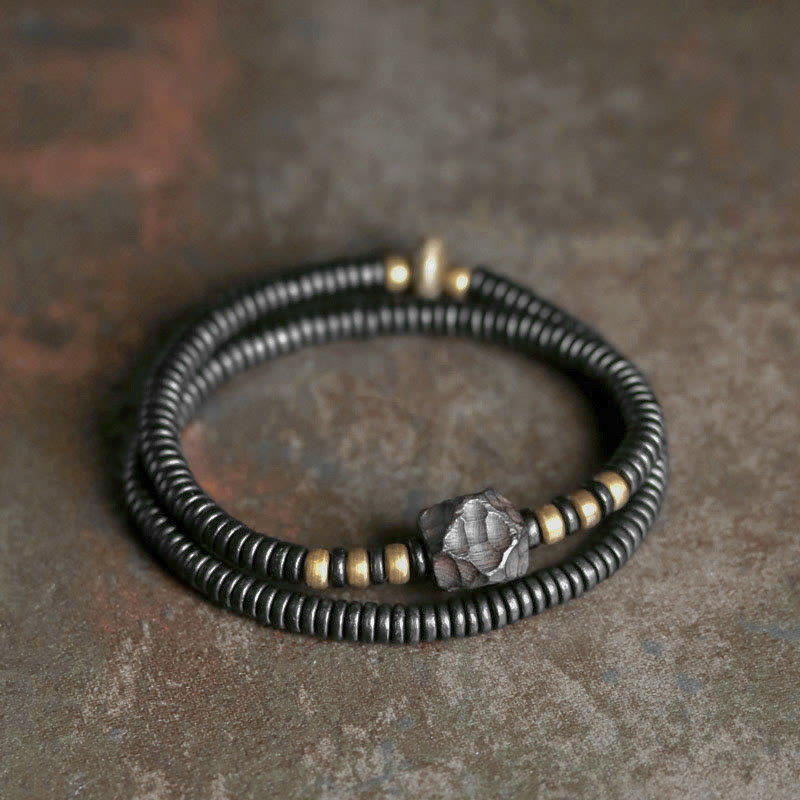 Bracelet double tour en bois d'ébène et cuivre avec Buddha Stones