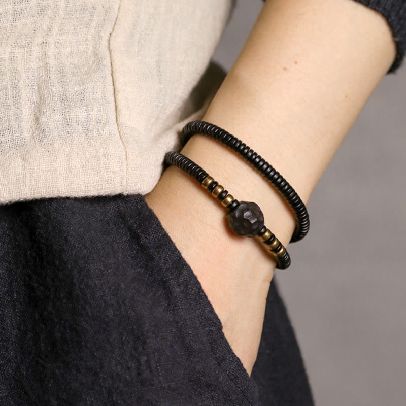 Bracelet double tour en bois d'ébène et cuivre avec Buddha Stones