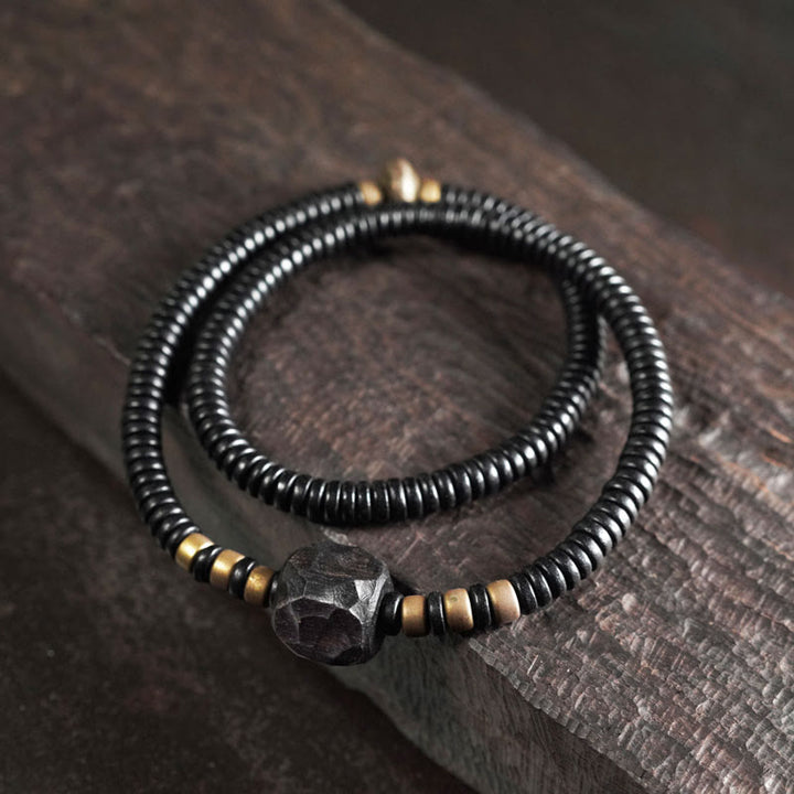 Bracelet double tour en bois d'ébène et cuivre avec Buddha Stones
