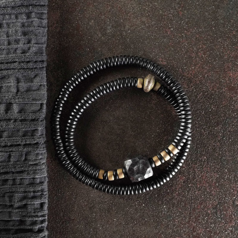 Bracelet double tour en bois d'ébène et cuivre avec Buddha Stones