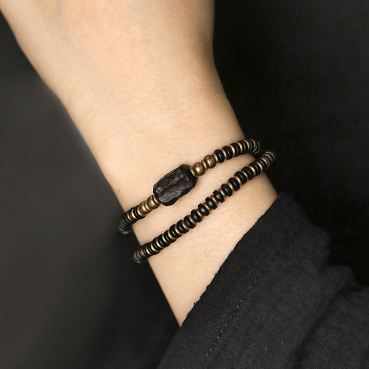 Bracelet double tour calme en cuivre et laiton Buddha Stones en bois d'ébène et bois de santal vert