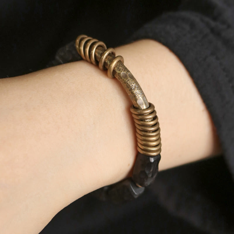 Bracelet de paix avec anneau circulaire en cuivre et laiton et Buddha Stones