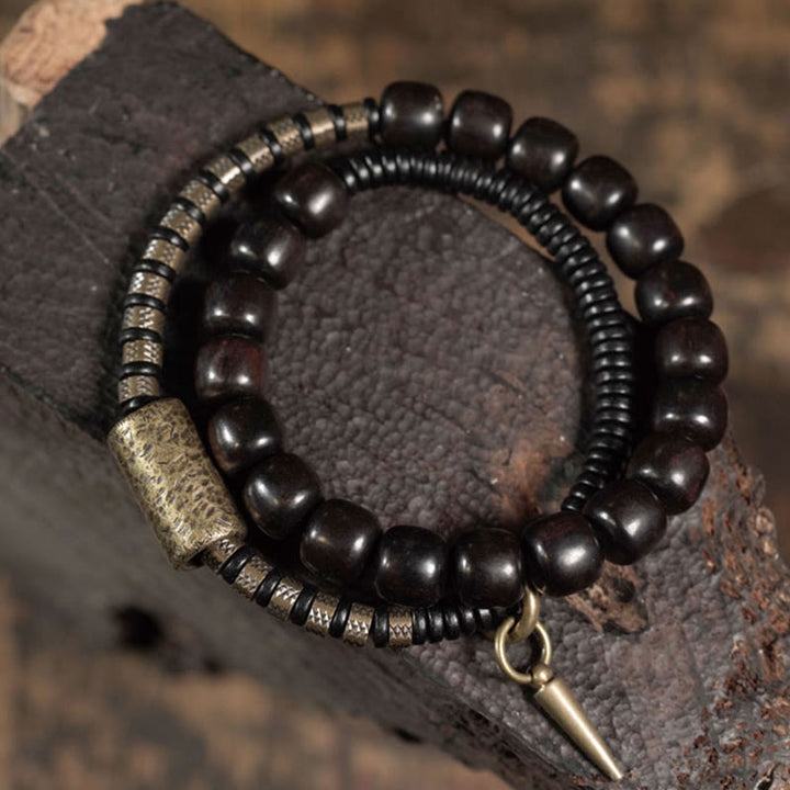 Bracelet d'équilibre à double tour en forme de cône avec perles vintage en bois d'ébène et cuivre et Buddha Stones