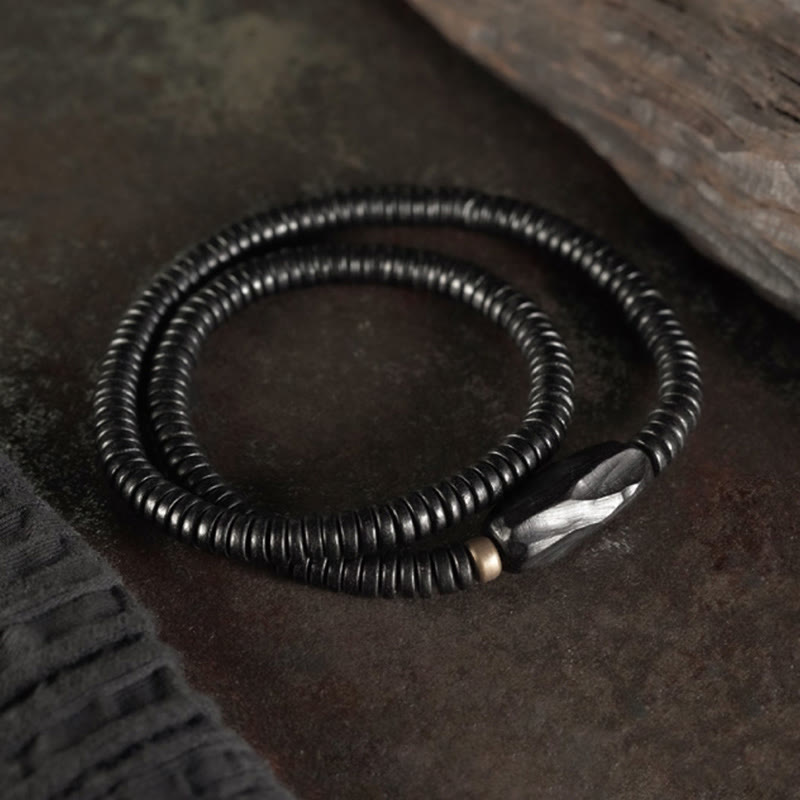 Bracelet triple tour en bois d'ébène, cuivre et laiton avec Buddha Stones