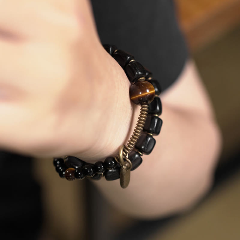 Bracelet double tour en Buddha Stones, bois d'ébène, cuivre, laiton, œil de tigre, paix