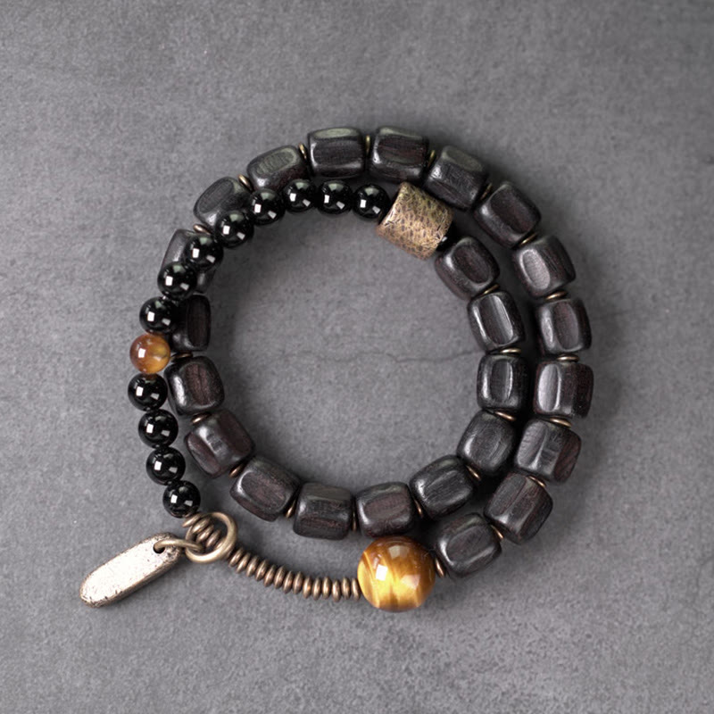 Bracelet double tour en Buddha Stones, bois d'ébène, cuivre, laiton, œil de tigre, paix