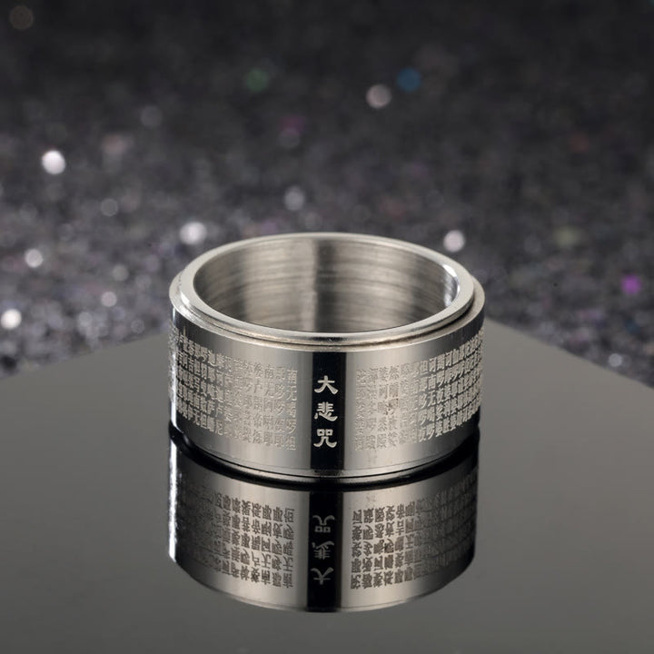 Bague rotative renforcée en acier titane sculpté avec mantra de la grande compassion de Buddha Stones