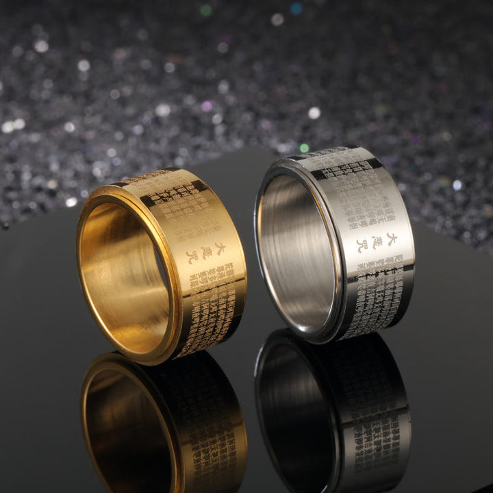 Bague rotative renforcée en acier titane sculpté avec mantra de la grande compassion de Buddha Stones