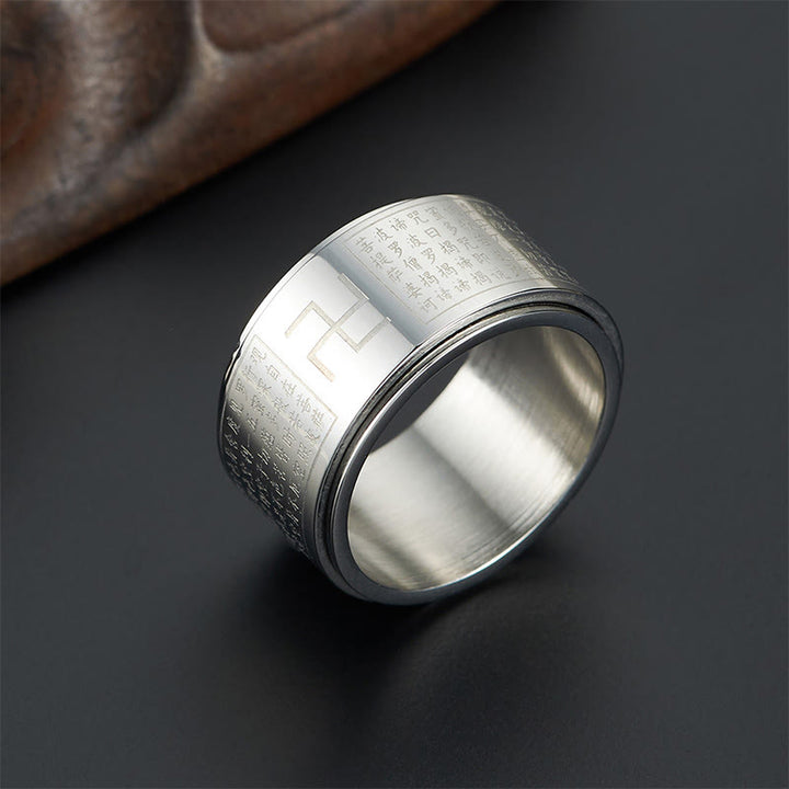 Bague rotative porte-bonheur en acier titane Buddha Stones et Sutra du cœur Swastika