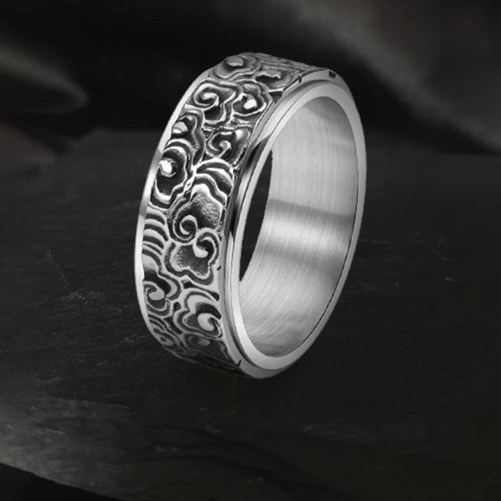 Bague rotative en acier titane sculptée avec motif de nuages de bon augure et Buddha Stones