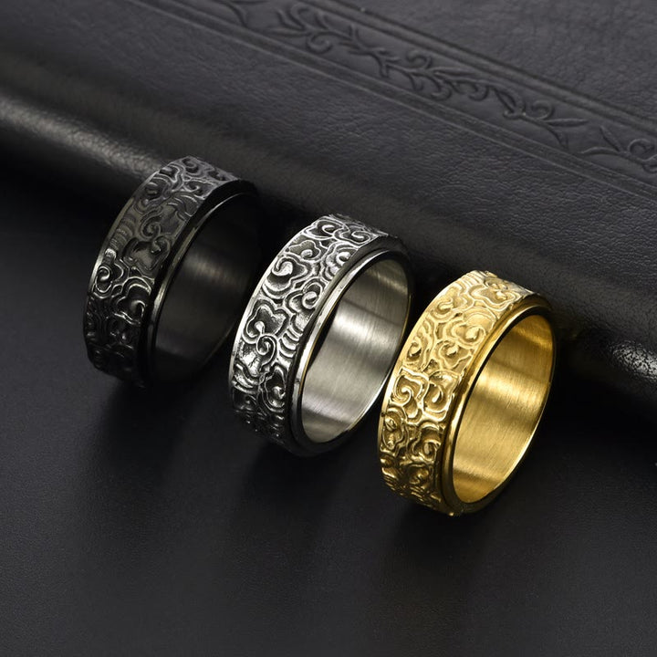 Bague rotative en acier titane sculptée avec motif de nuages de bon augure et Buddha Stones