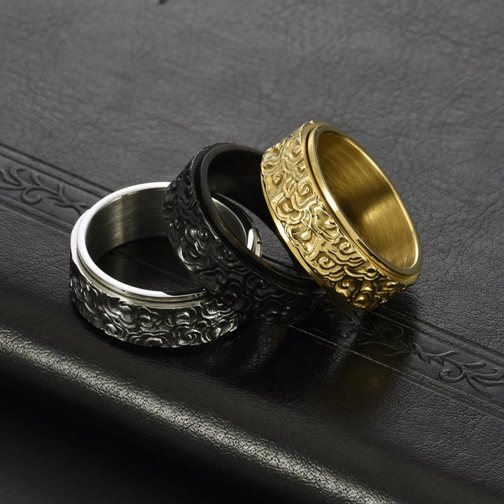 Bague rotative en acier titane sculptée avec motif de nuages de bon augure et Buddha Stones