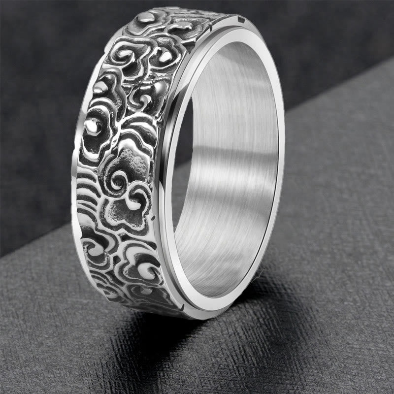 Bague rotative en acier titane sculptée avec motif de nuages de bon augure et Buddha Stones