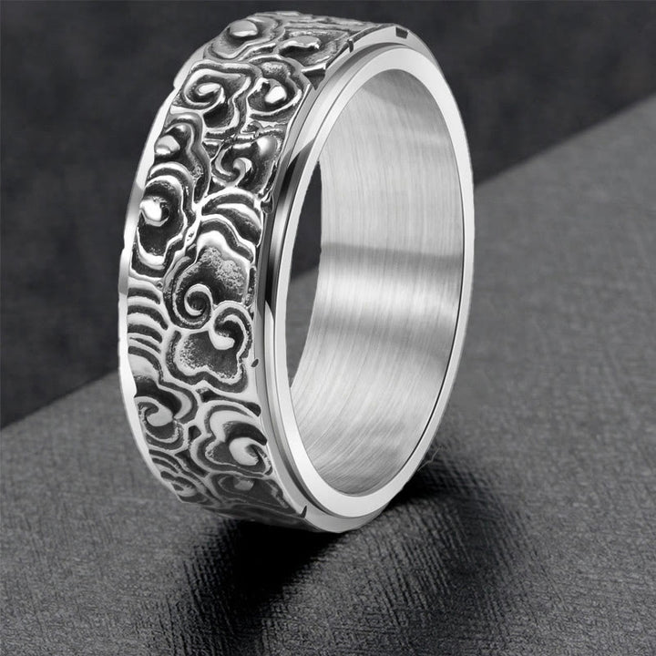 Bague rotative en acier titane sculptée avec motif de nuages de bon augure et Buddha Stones