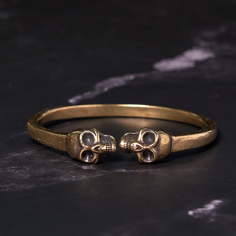 Bracelet manchette en cuivre et laiton avec double tête de mort et Buddha Stones Le Seigneur de la forêt des cadavres