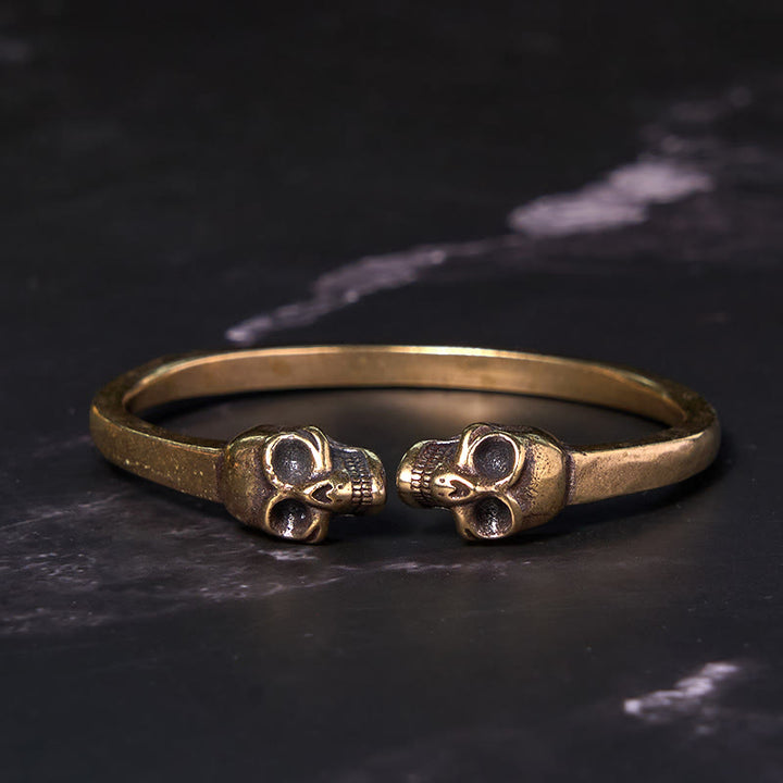 Bracelet manchette en cuivre et laiton avec double tête de mort et Buddha Stones Le Seigneur de la forêt des cadavres