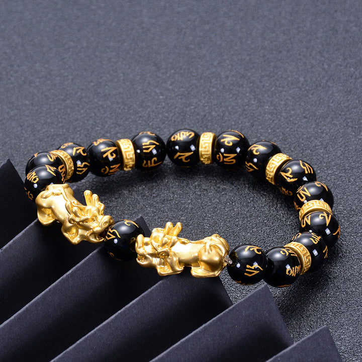 Bracelet de force en Buddha Stones en obsidienne noire et onyx noir en alliage doré à deux PiXiu Om Mani Padme Hum