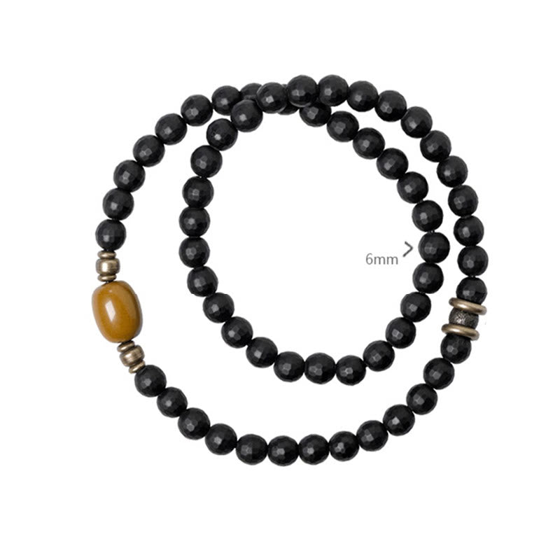Bracelet de protection à double tour en perles d'onyx noir et de topaze à surface coupée givrée avec Buddha Stones
