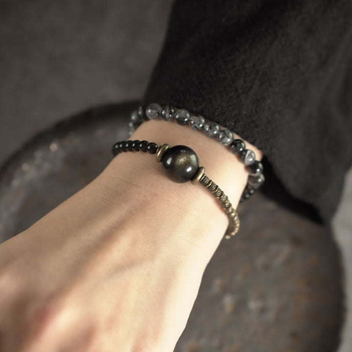 Bracelet de protection à double tour en cuivre et laiton avec Buddha Stones et obsidienne brillante dorée et quartz rutile noir