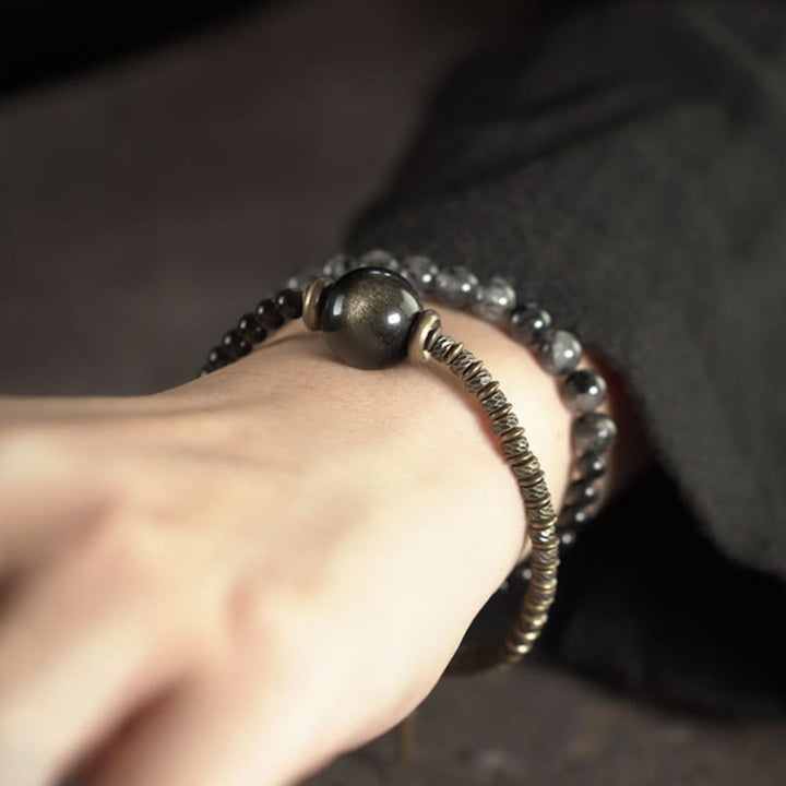 Bracelet de protection à double tour en cuivre et laiton avec Buddha Stones et obsidienne brillante dorée et quartz rutile noir