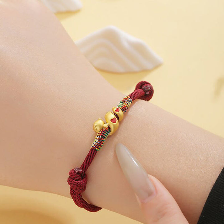 Bracelet tressé en alliage de cuivre avec cordon rouge et Buddha Stones, protection de l'année du serpent