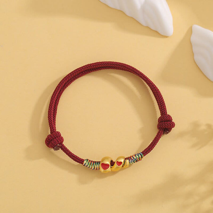Bracelet tressé en alliage de cuivre avec cordon rouge et Buddha Stones, protection de l'année du serpent
