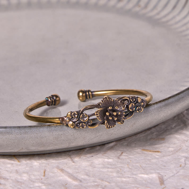 Bracelet manchette de guérison porte-bonheur en cuivre et laiton avec Buddha Stones et fleurs et feuilles