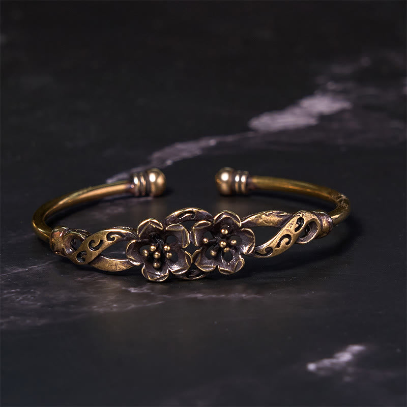 Bracelet manchette de guérison porte-bonheur en cuivre et laiton avec Buddha Stones et fleurs et feuilles