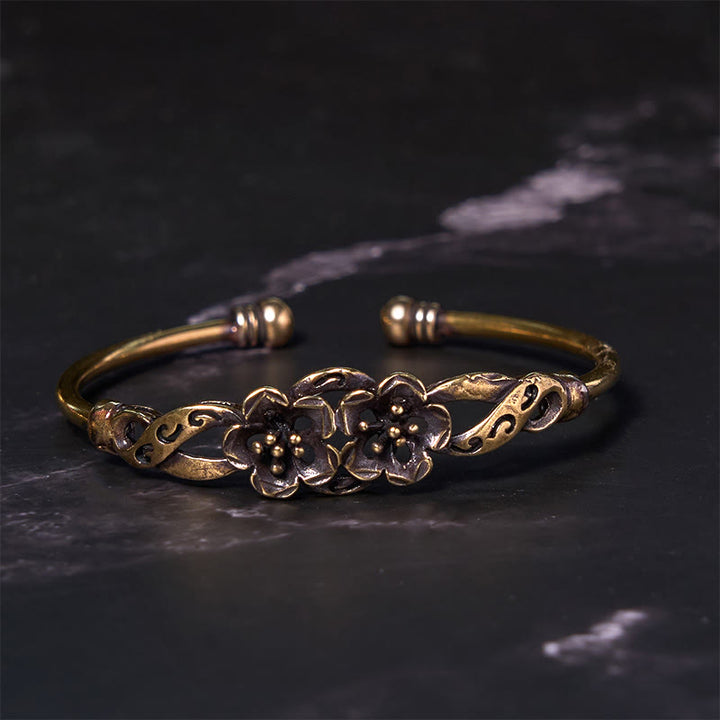 Bracelet manchette de guérison porte-bonheur en cuivre et laiton avec Buddha Stones et fleurs et feuilles