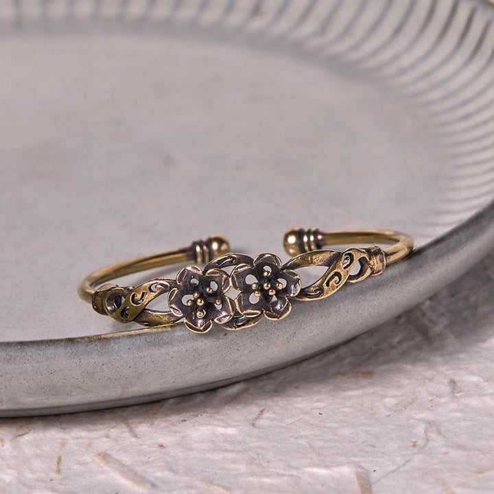 Bracelet manchette de guérison porte-bonheur en cuivre et laiton avec Buddha Stones et fleurs et feuilles