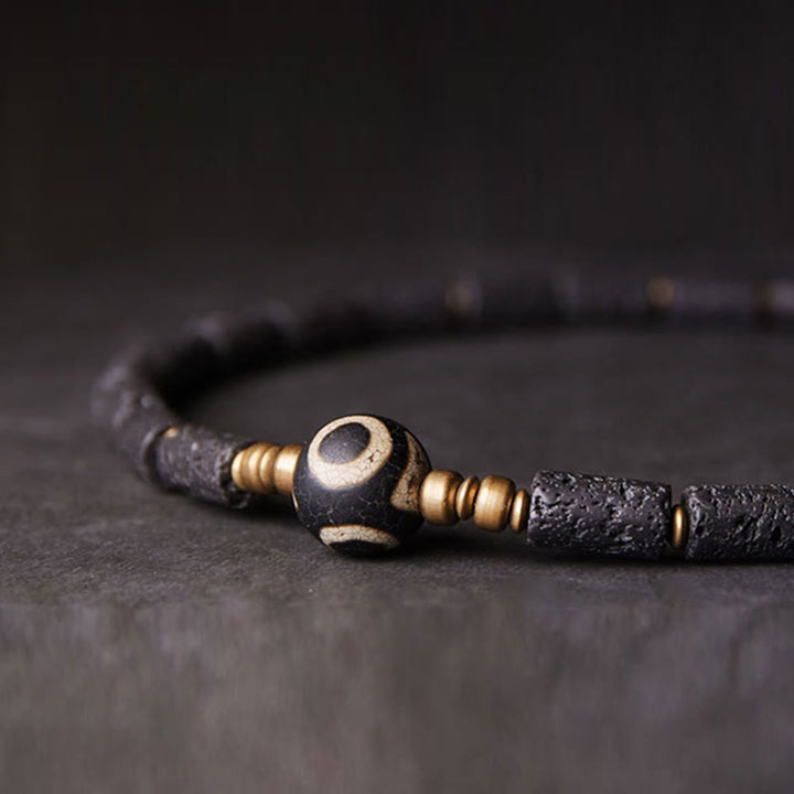 Bracelet en cuivre et laiton à plusieurs tours avec perles de lave vintage à trois yeux et pierres de Buddha Stones