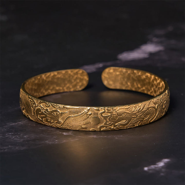 Bracelet de protection porte-bonheur en cuivre et laiton sculpté avec Buddha Stones, dragon et phénix jouant avec une perle
