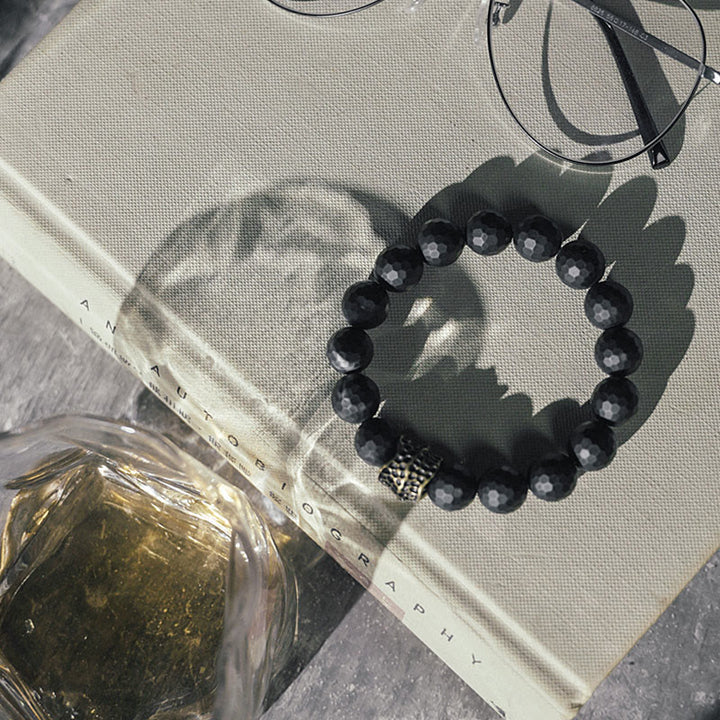 Bracelet de protection en cuivre et laiton avec onyx noir mat givré et Buddha Stones