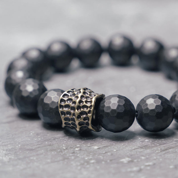 Bracelet de protection en cuivre et laiton avec onyx noir mat givré et Buddha Stones