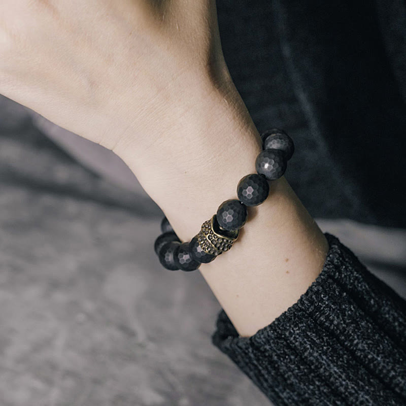 Bracelet de protection en cuivre et laiton avec onyx noir mat givré et Buddha Stones